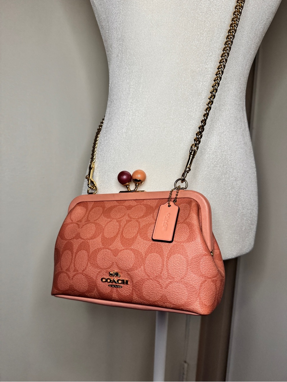 Coach Coral Signature Kisslock Crossbody Bag